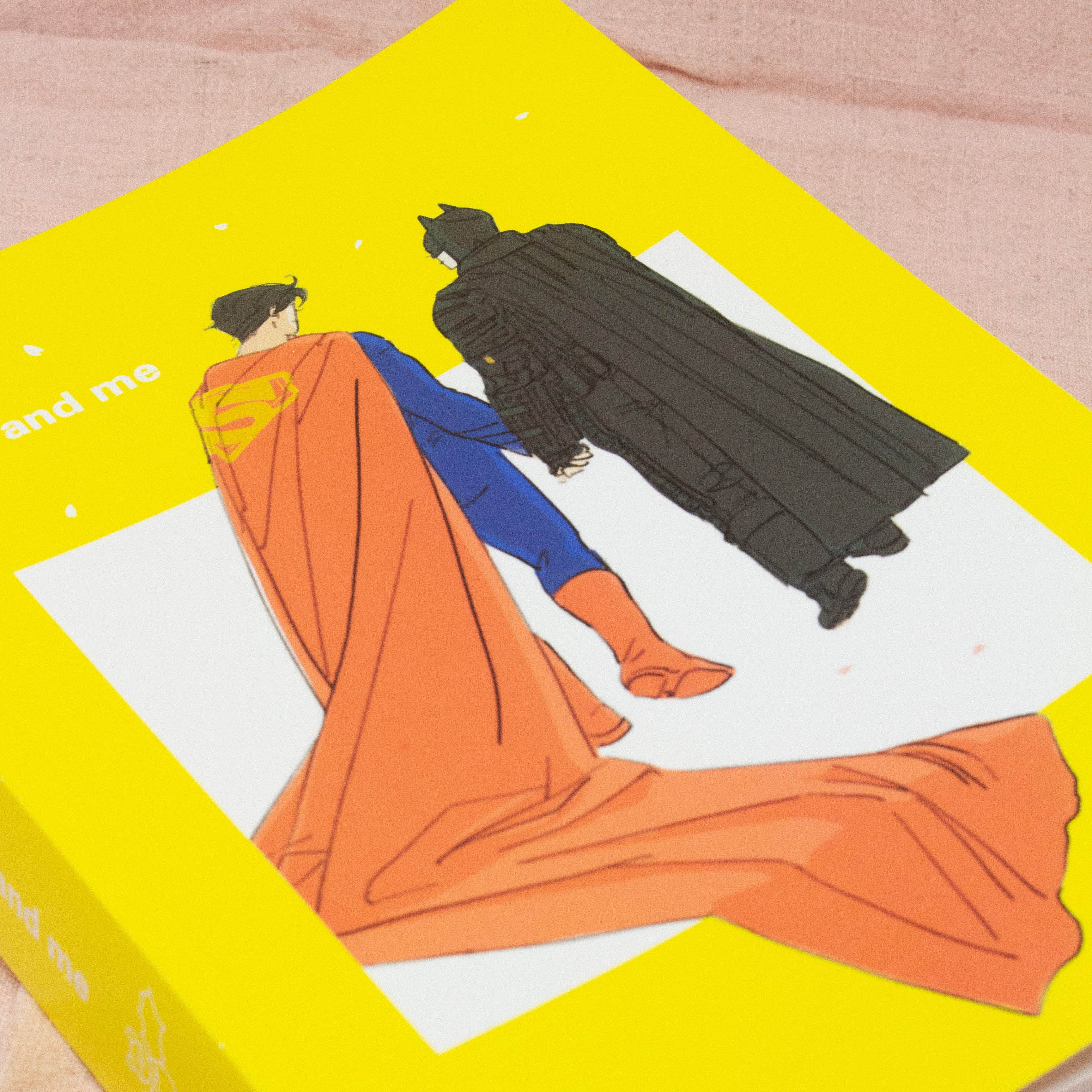 Book with colorful illustrations of people on a yellow cover