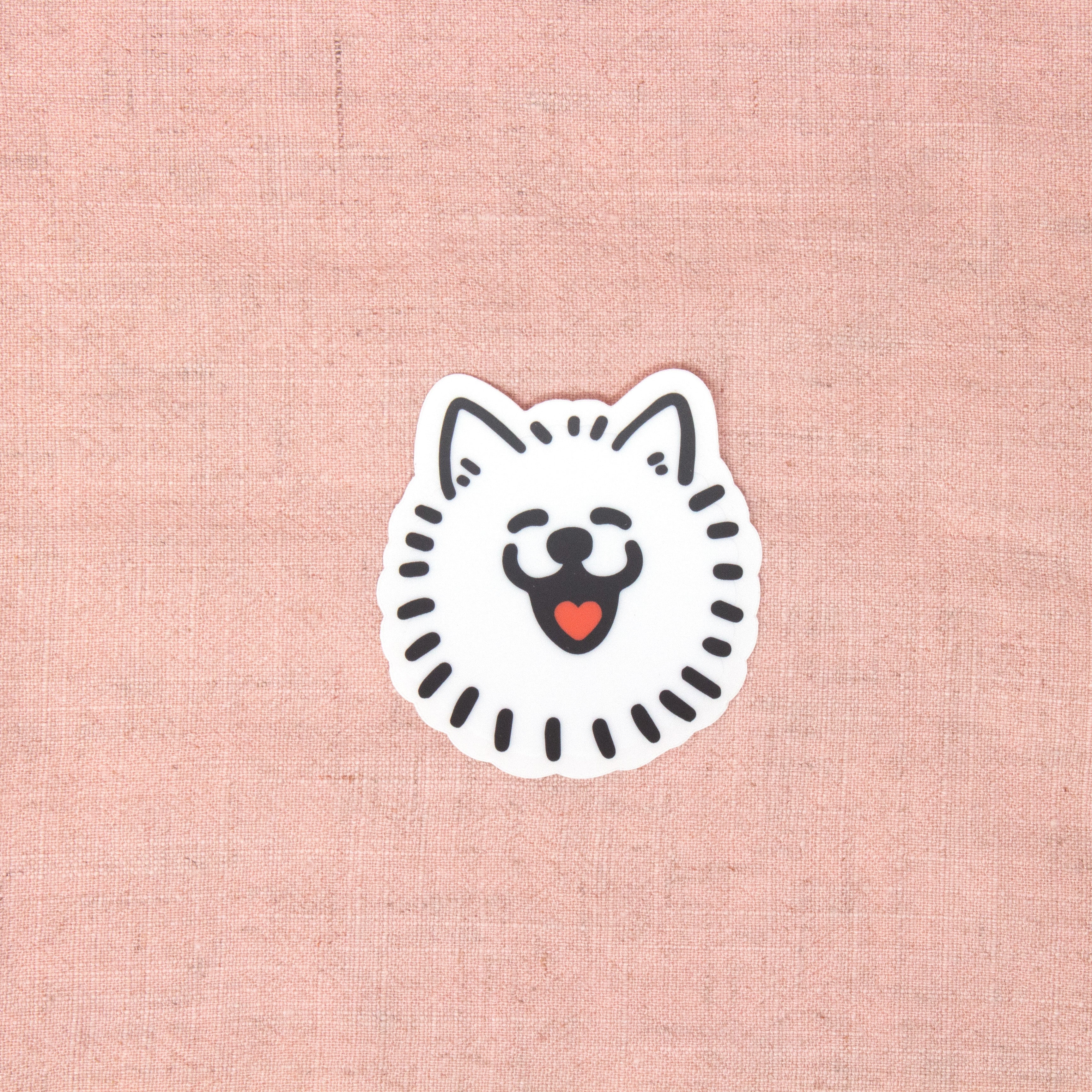 Sticker of a dog face on a pink textured background